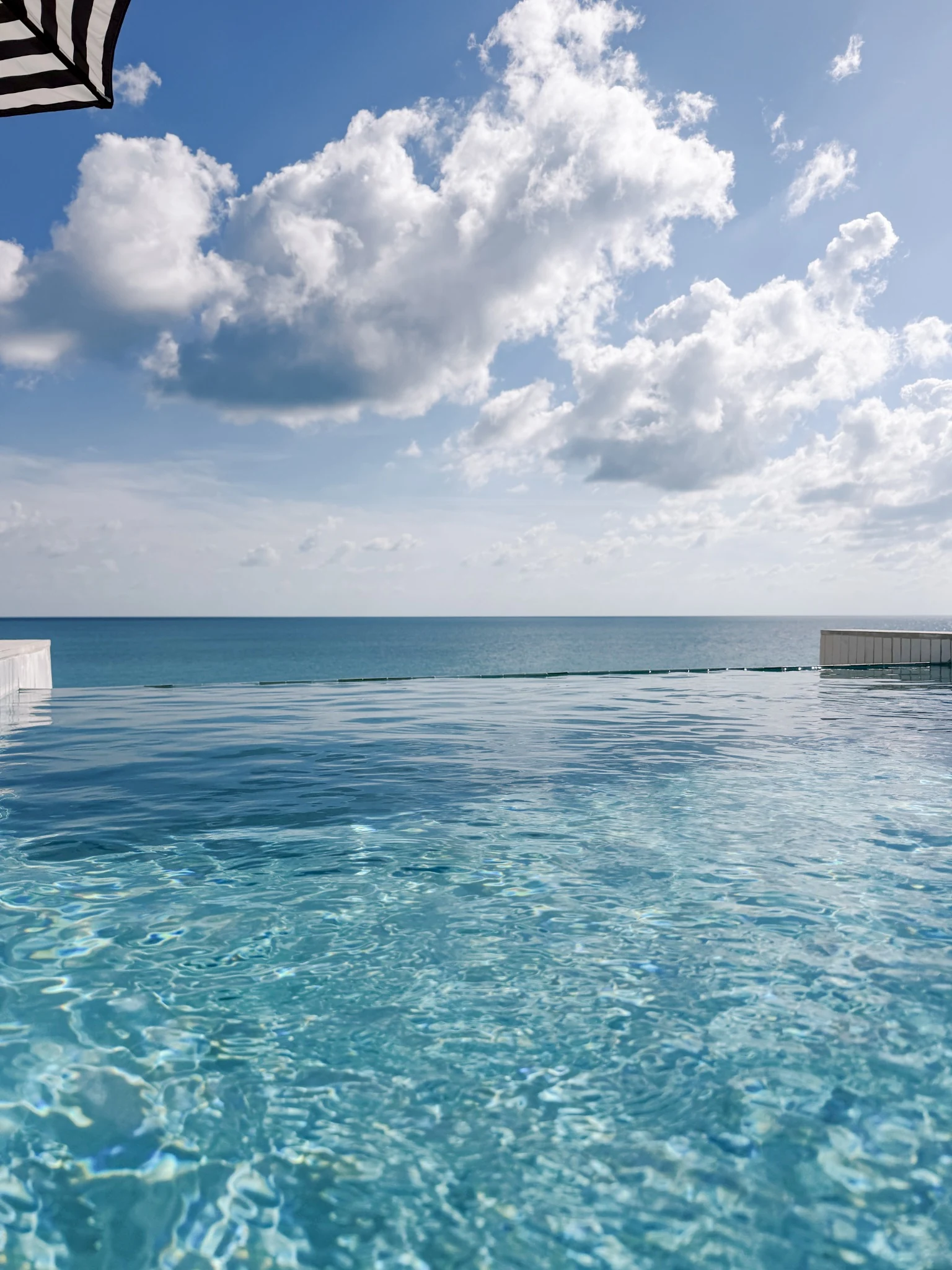 The private CLIFFHOUSE pool overlooking the ocean in Rainbow Bay, Eleuthera.